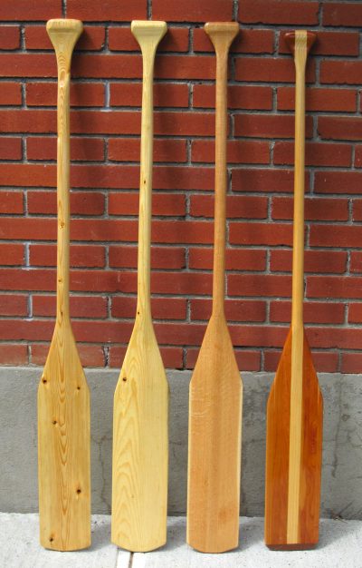  oak. The paddle on the right is the original "Grey Owl" brand paddle