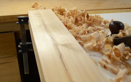 When used on wood, a well sharpened hand plane blade leaves a 