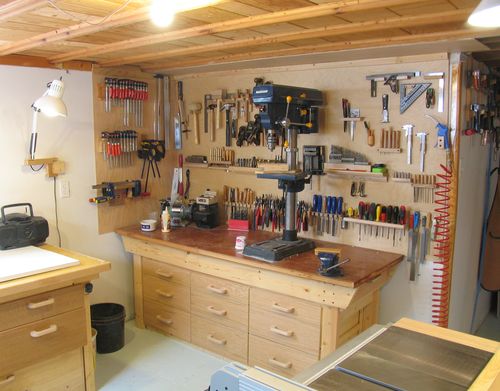 is the workbench where I keep a lot of my hand tools on some wall tool ...