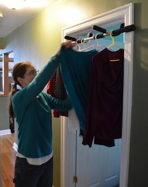 Clothes hanger best sale on door