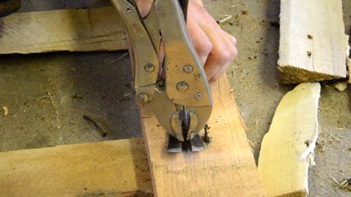 pulling nails out of wood