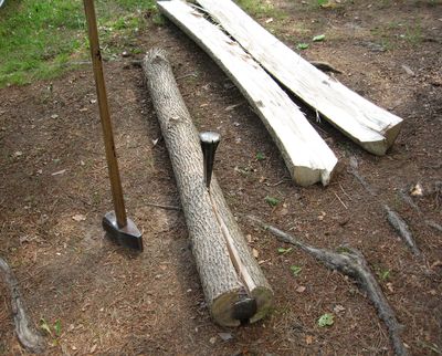 Splitting logs for woodworking lumber