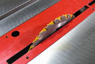 stack of sawblades in the table saw