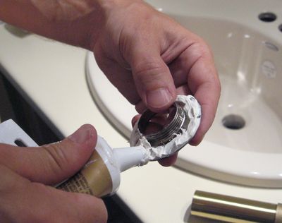 Installing A New Bathroom Sink, How To Caulk A Bathroom Sink Faucet