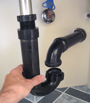 Replace bathroom store sink drain