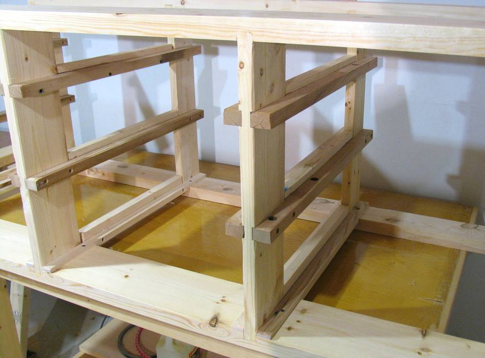 The drawer slides are all rabbeted into the uprights. The dado joint 